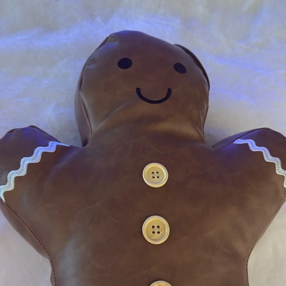 Aspen Christmas gingerbread man faux leather pillow